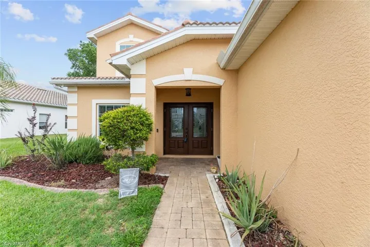 Entrance to property featuring french doors