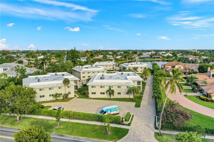 Aerial view of residential area with a large body of water