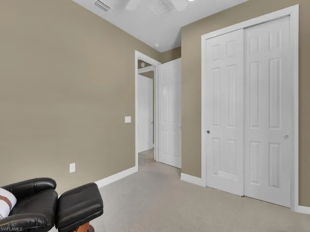 Sitting room with light carpet
