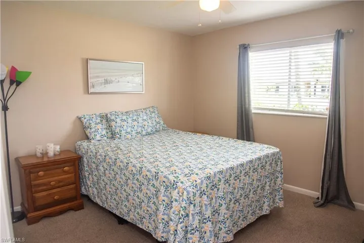 Bedroom with carpet floors and ceiling fan