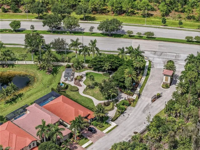 Aerial perspective of gates entrance featuring a small community park overlooking a lake