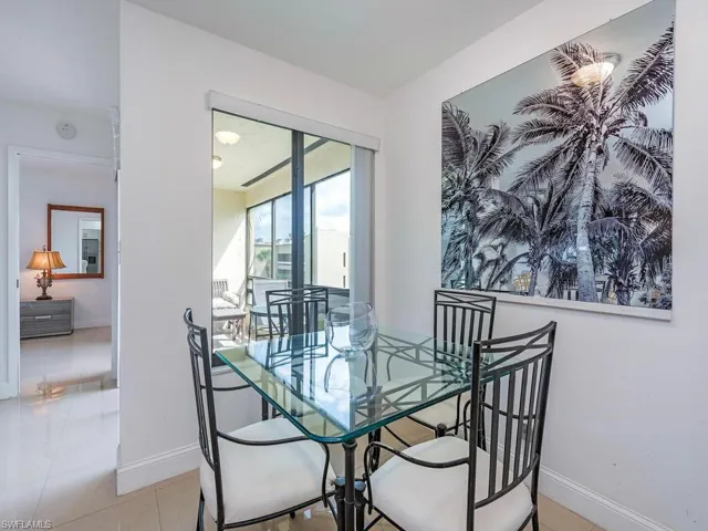 Dining space featuring baseboards and tile patterned floors