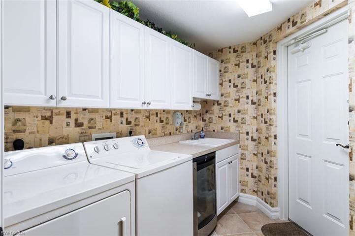 Laundry with sink and storage