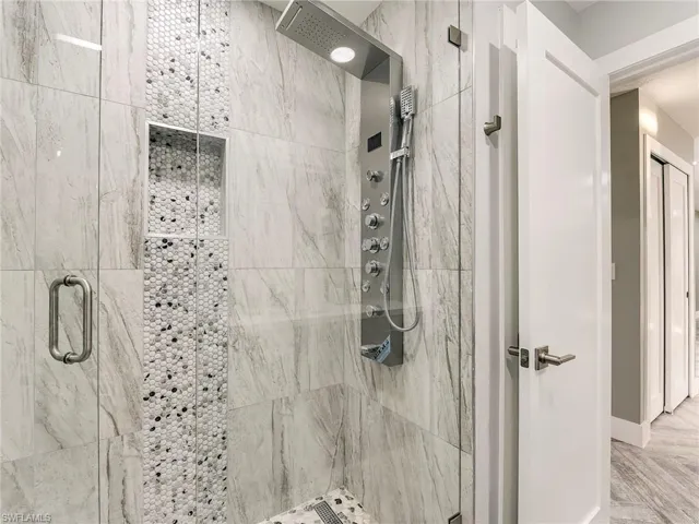 Spacious Primary Shower, gorgous tile work
