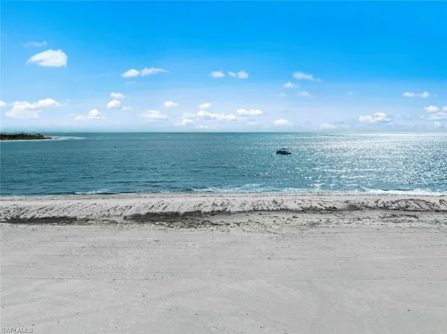 View of water feature with a beach view