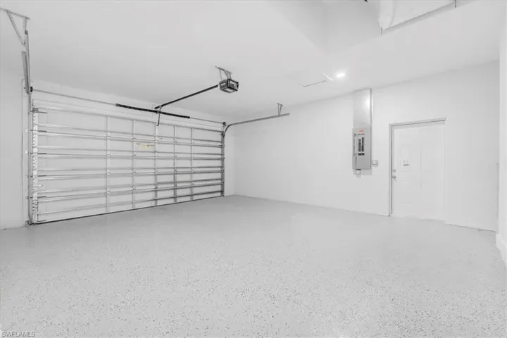 Garage featuring electric panel