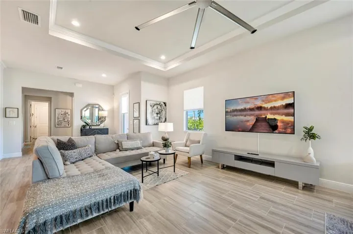 Living room with a tray ceiling