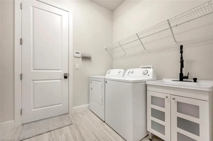 Laundry room featuring washer and dryer