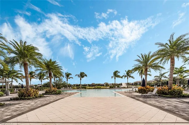 Surrounding community featuring a swimming pool and a patio