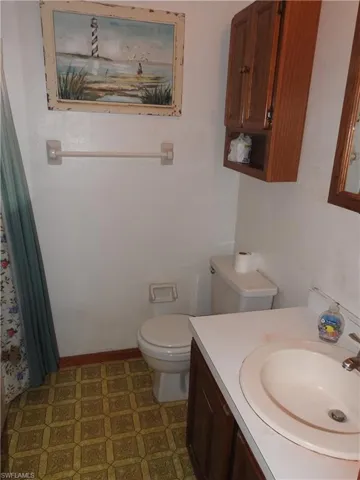 Bathroom with vanity and toilet