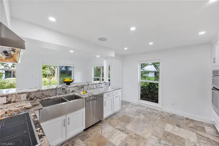 Dining Area with sliding glass doors leading to private patio.