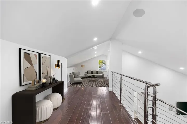 Light filled kitchen opens to dining area.