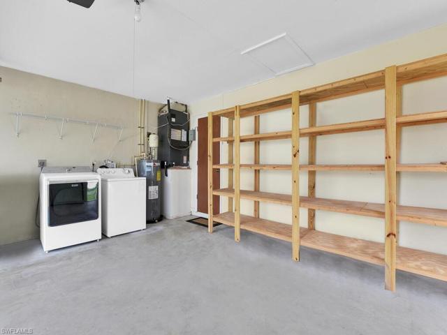 Shelving & Laundry Area In Garage