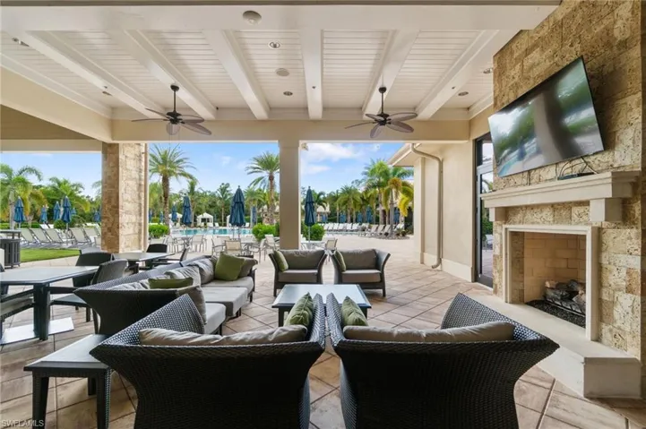 Outdoor Fireplace and TV area for lounging with friends and neighbors