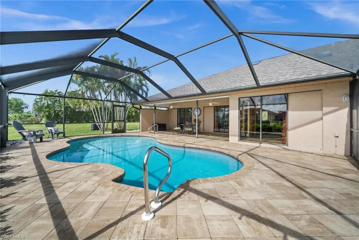 Enjoy pool and canal views from your spacious covered lanai.