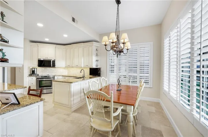 Charming breakfast area featuring beautiful lake views.