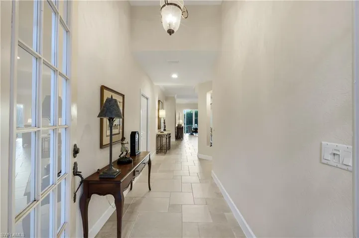 The grand entry flows beautifully into the living space.