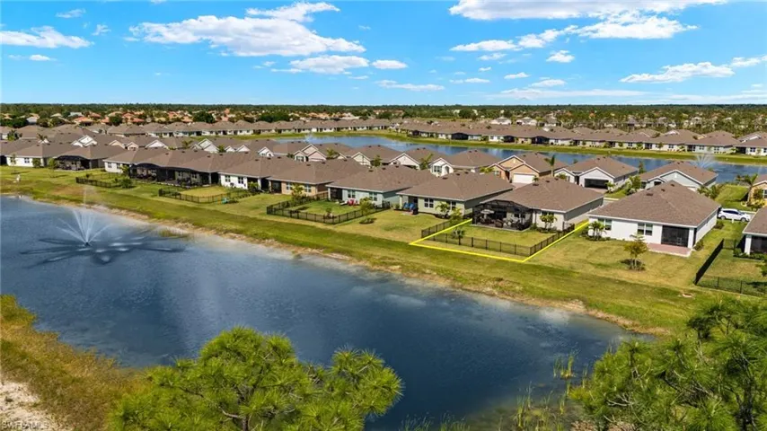 Aerial view with a residential view and a water view