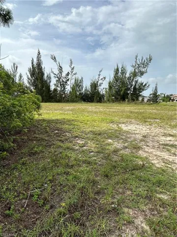 View of yard with a view of countryside