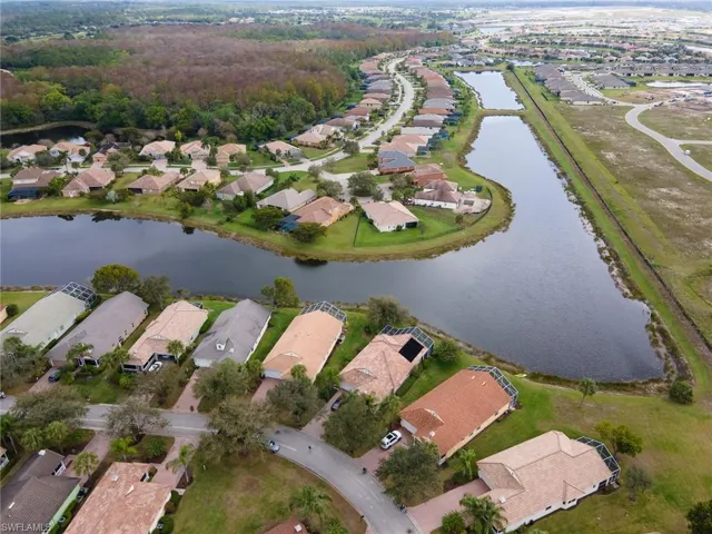 View of property location with nearby suburban area and a large body of water