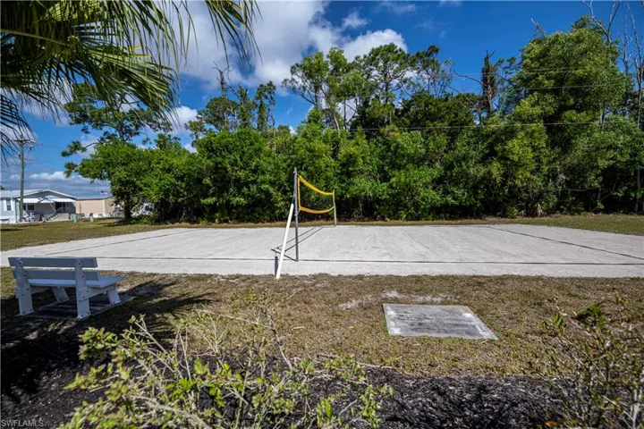 Surrounding community featuring volleyball court