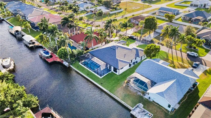Aerial view of residential area with a large body of water