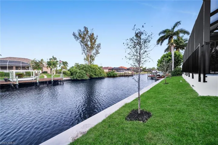 Water view featuring a dock