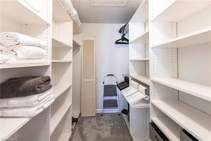 Primary Bedroom closet with organizers