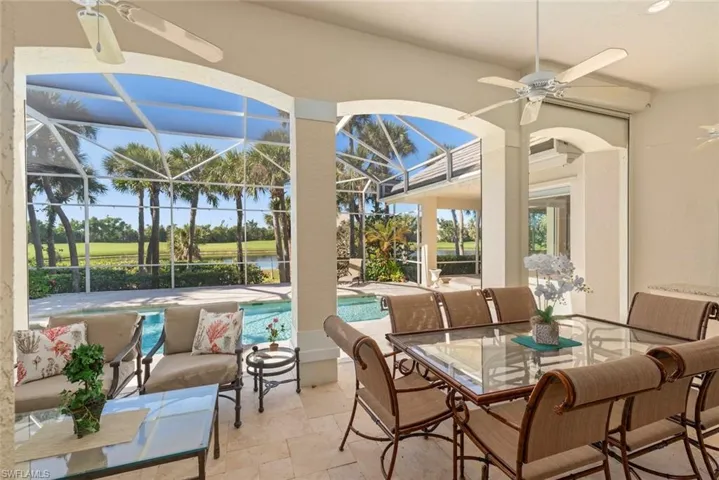 Gorgeous covered lanai perfect for al fresco dining and entertaining