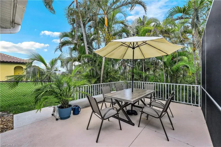 View of patio / terrace / sun deck There are banana trees and lime / lemon trees on the side of the house next to this beautiful deck.