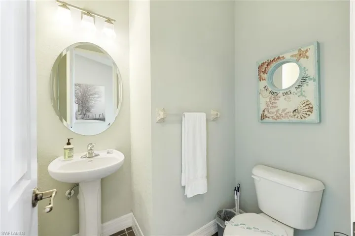 Bathroom with sink and toilet