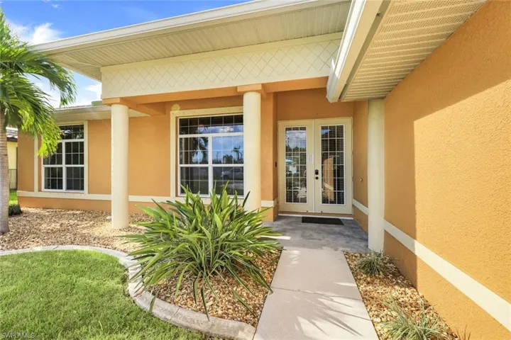 Doorway to property with french doors