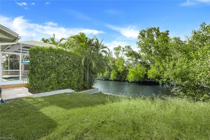 View of backyard and canal