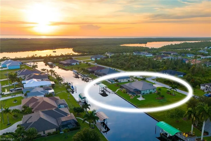Aerial view at dusk with a water view