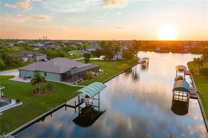 Aerial view at dusk with a water view