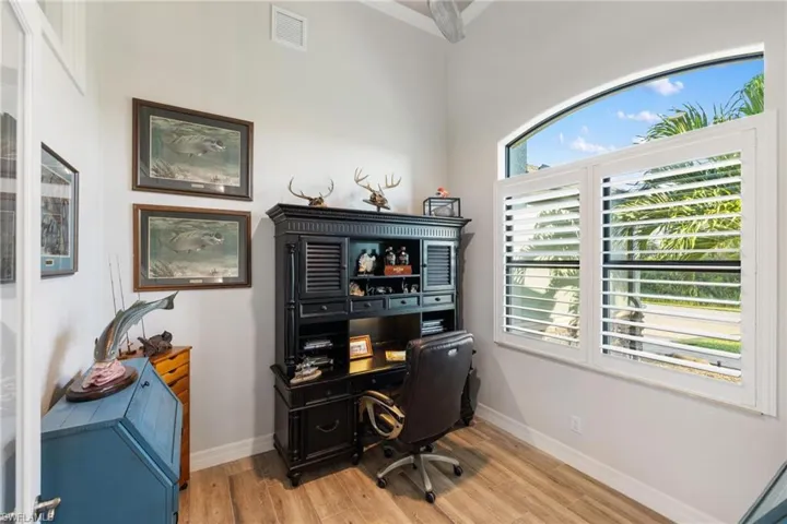Office area featuring a healthy amount of sunlight and light hardwood / wood-style flooring