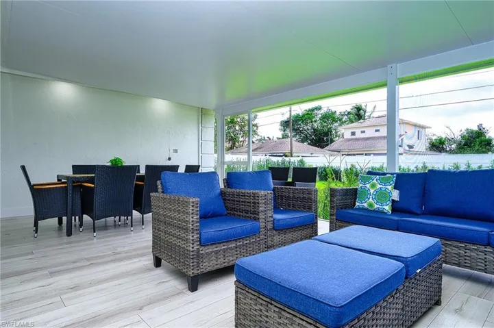 Enclosed large back entertainment area off the kitchen, dinette and living room.