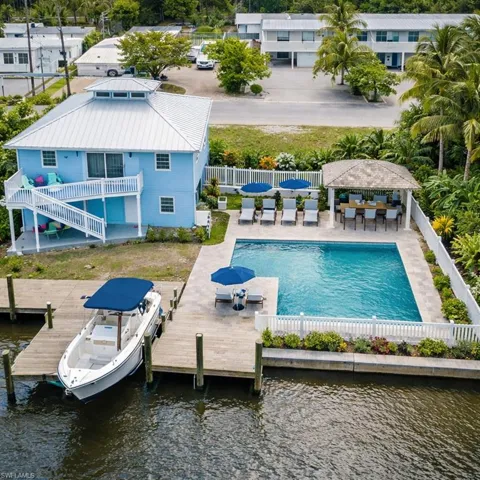 AI generated pool area  and dock with boat lift