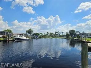 Water view with a dock