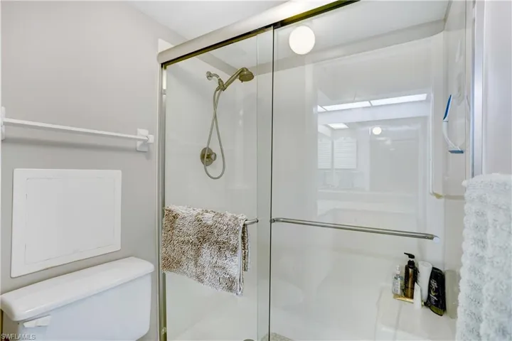 Shower with glass shower door