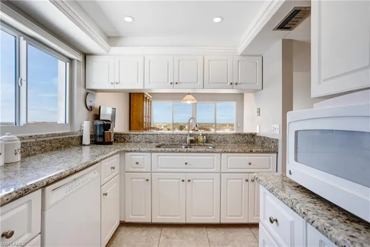 Side windows in the kitchen, great room, and balcony!