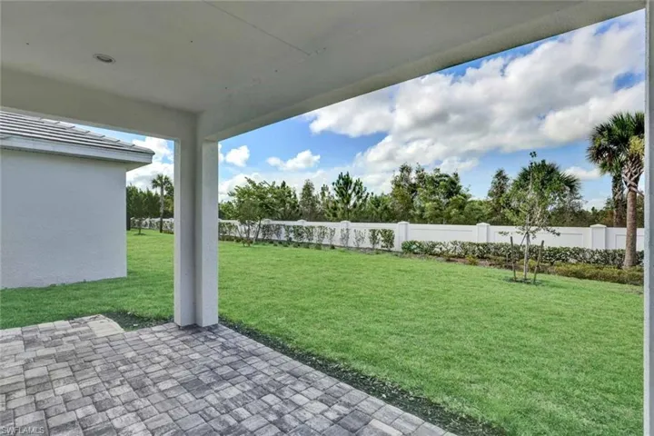 Backyard view underneath covered lanai