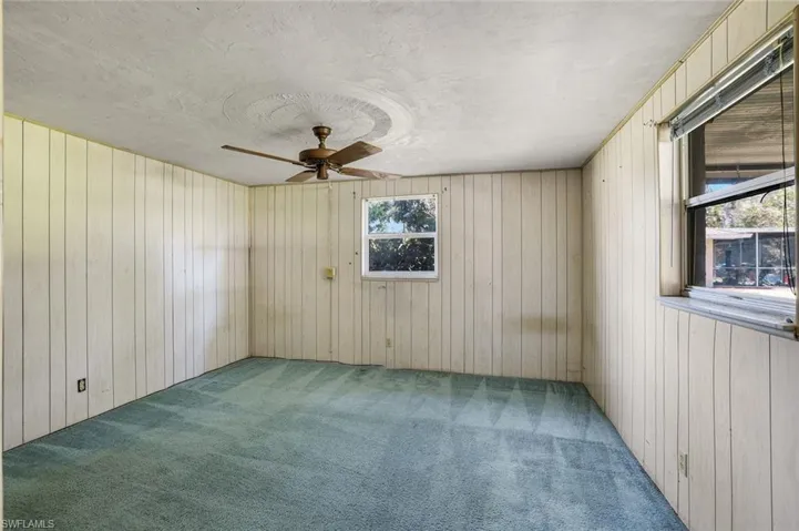 Fourth bedroom located off the family room