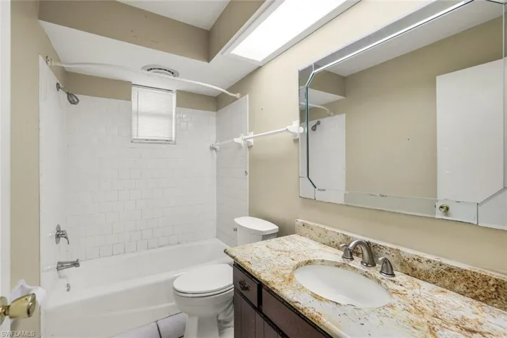 Guest bath with shower-over-tub combination