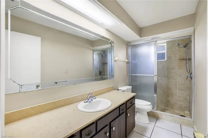 Primary bath with expansive vanity and step-in shower