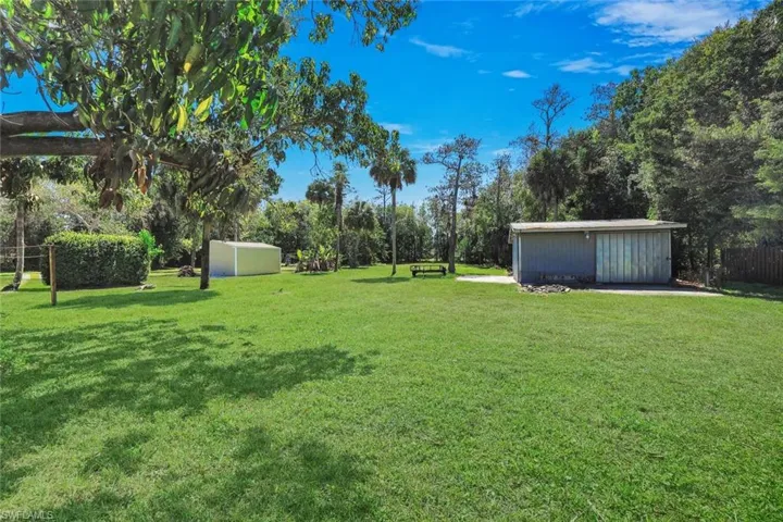 One-acre parcel with southern exposure includes a detached workshop