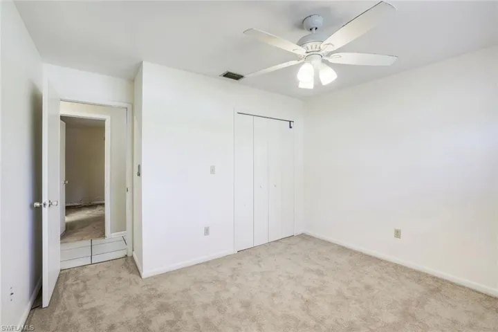 Second bedroom with window overlooking the front yard