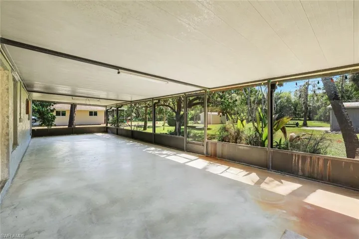 Screened-in lanai spanning length of the home