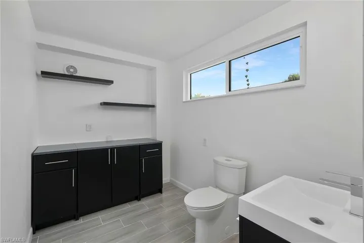 half bathroom lower level (Enough space to turn into a full bathroom)