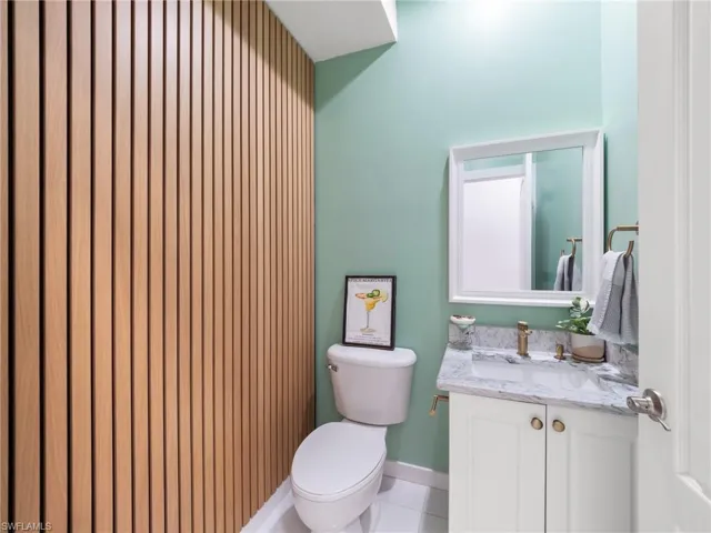 Bathroom with vanity and tile patterned floors